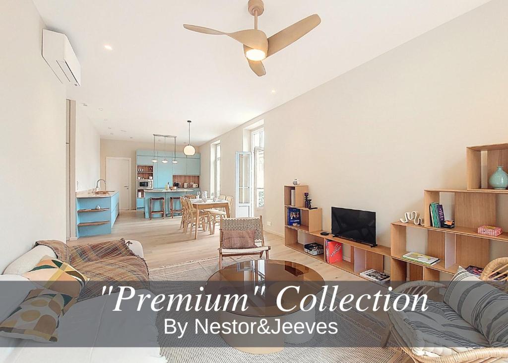 un salon avec un canapé et un ventilateur de plafond dans l'établissement Nestor&Jeeves - PEPYTE - Design - Near Beach, à Nice