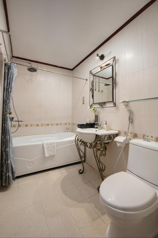 Koupelna v ubytování Bonjour D'An Nam Hotel