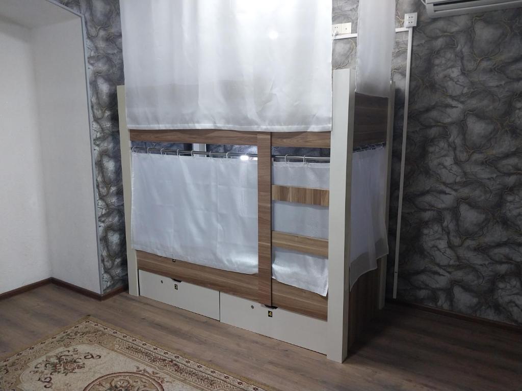 Postel nebo postele na pokoji v ubytování KING Hostel Center