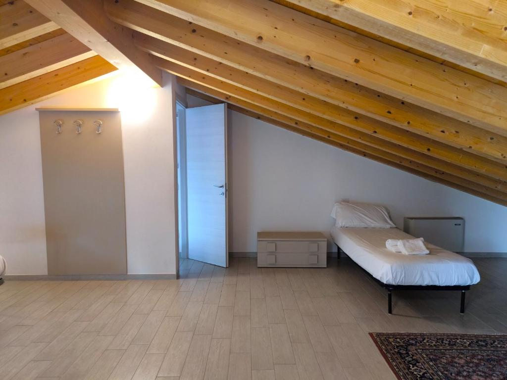 Łóżko lub łóżka w pokoju w obiekcie Residenza Pastrengo
