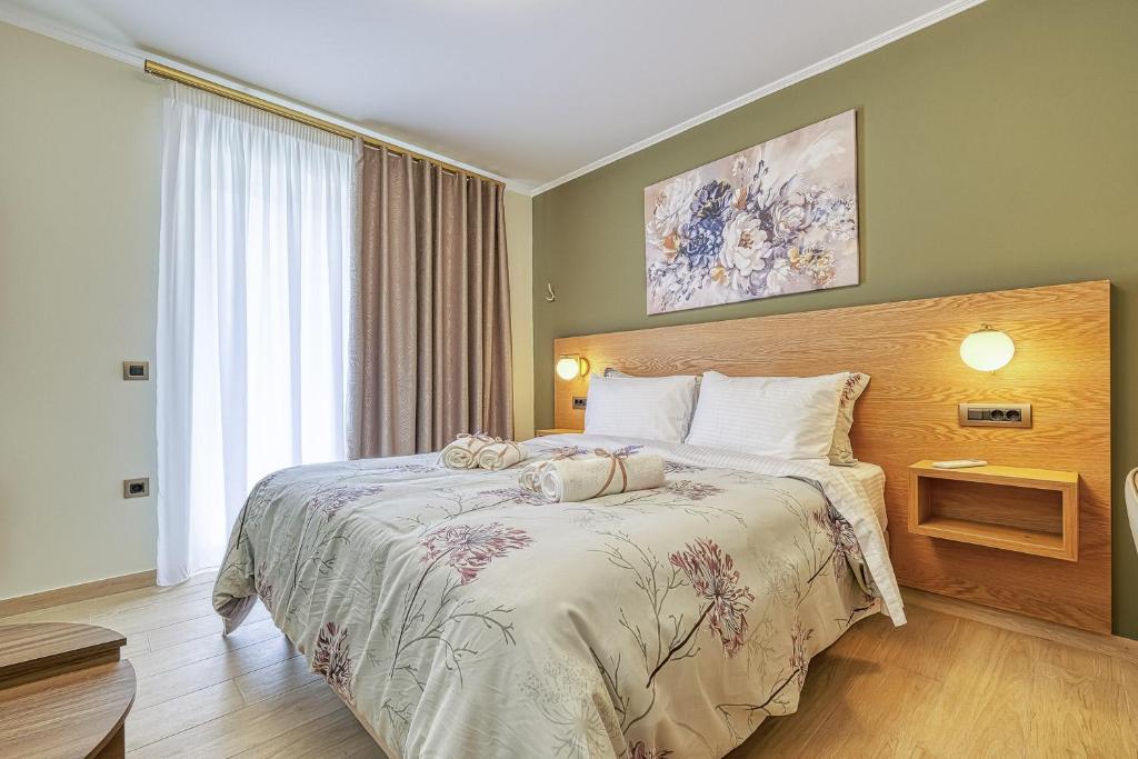 Postel nebo postele na pokoji v ubytování Nafplia Castle