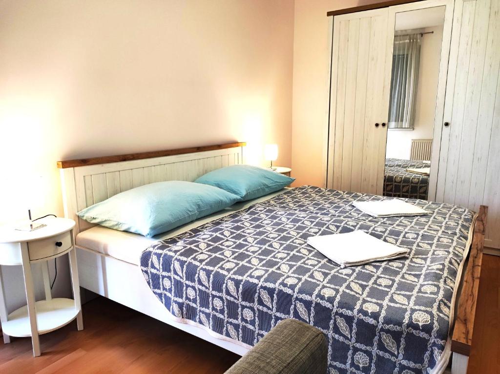 Posteľ alebo postele v izbe v ubytovaní Bella Golden Beach Siófok