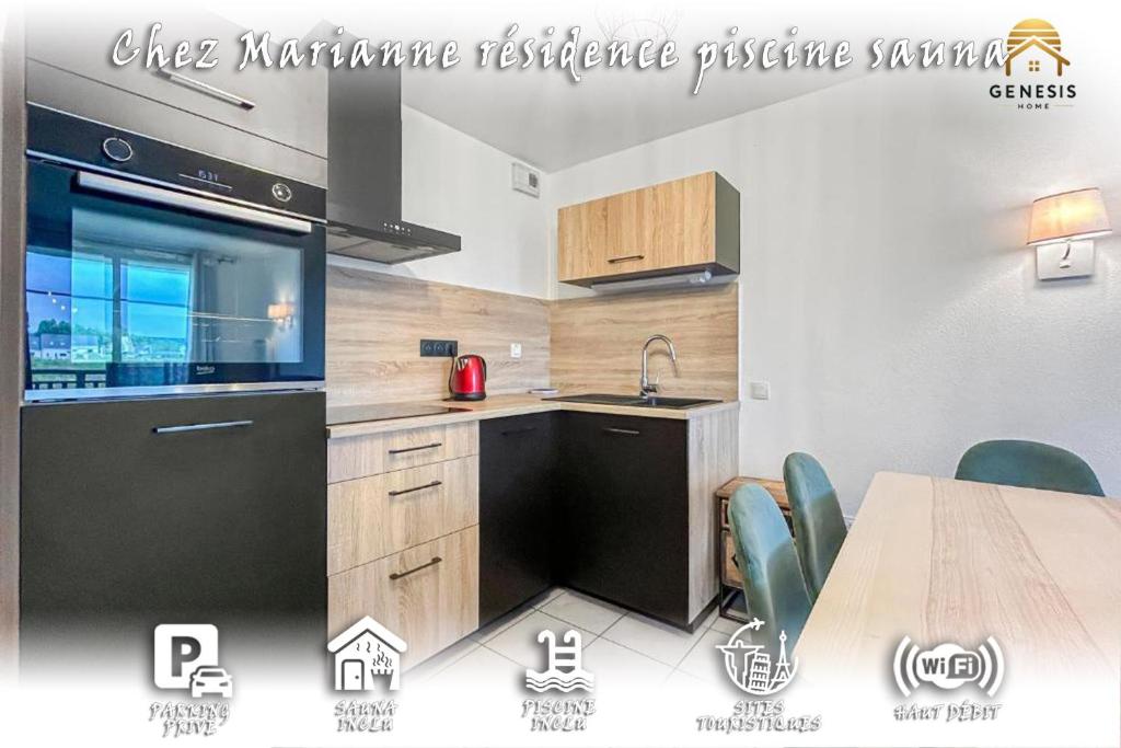 Η κουζίνα ή μικρή κουζίνα στο Chez Marianne Résidence Piscine Sauna