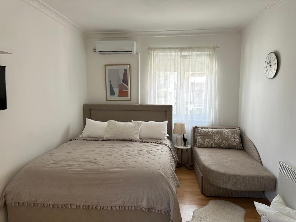 Posteľ alebo postele v izbe v ubytovaní Apartments Charming