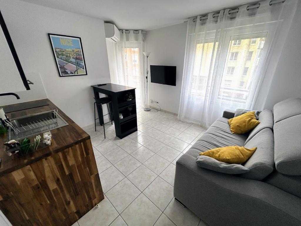 Et tv og/eller underholdning på Magnifique studio au bord de mer