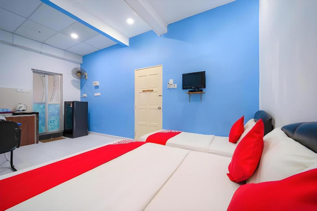Letto o letti in una camera di Super OYO 89807 My Budget Home