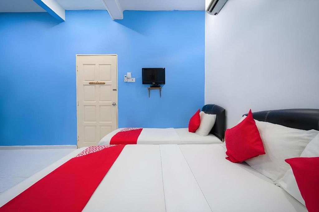 Letto o letti in una camera di Super OYO 89807 My Budget Home