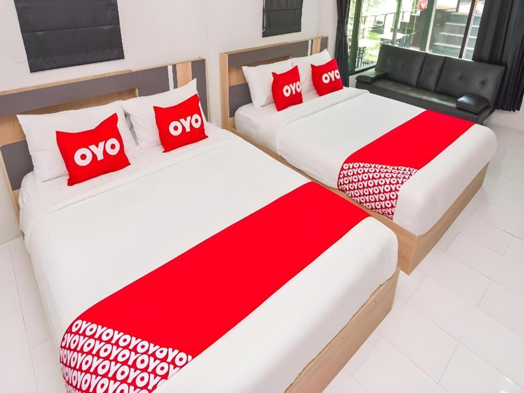 Postel nebo postele na pokoji v ubytování Nana River Kaeng Krachan