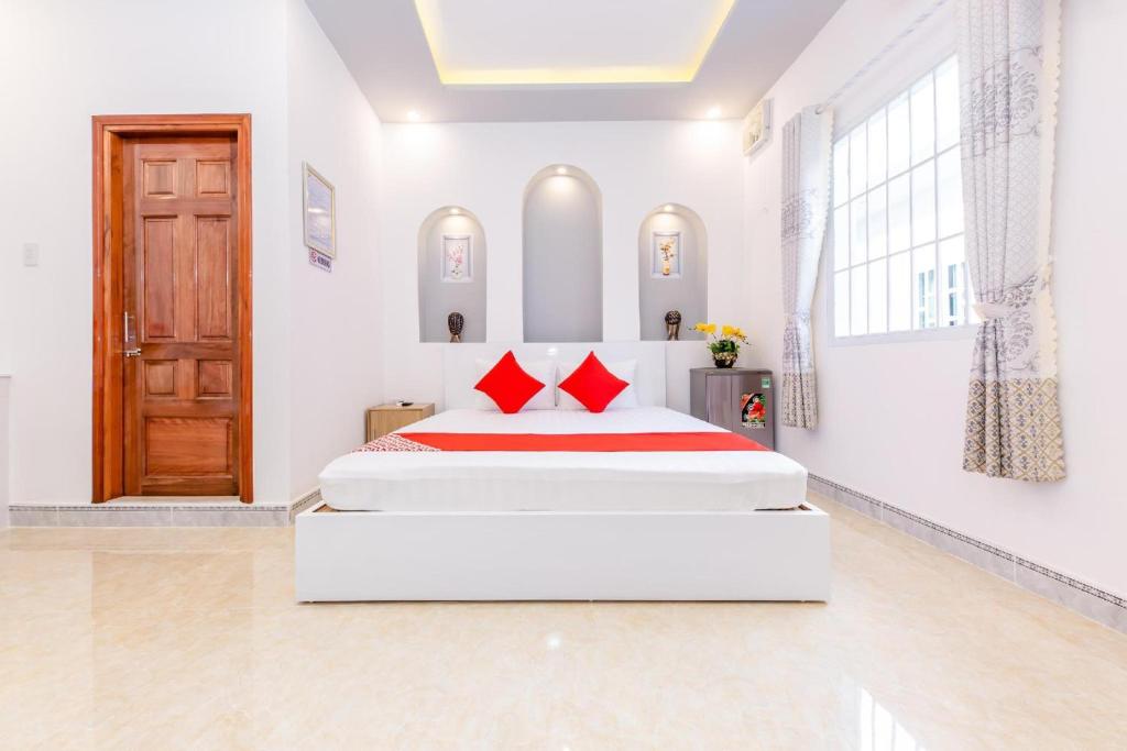 Postel nebo postele na pokoji v ubytování Super OYO 598 Peony Hotel