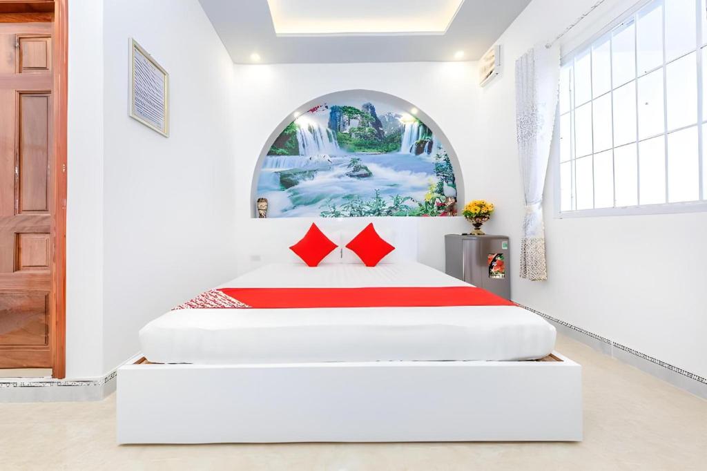 Postel nebo postele na pokoji v ubytování Super OYO 598 Peony Hotel