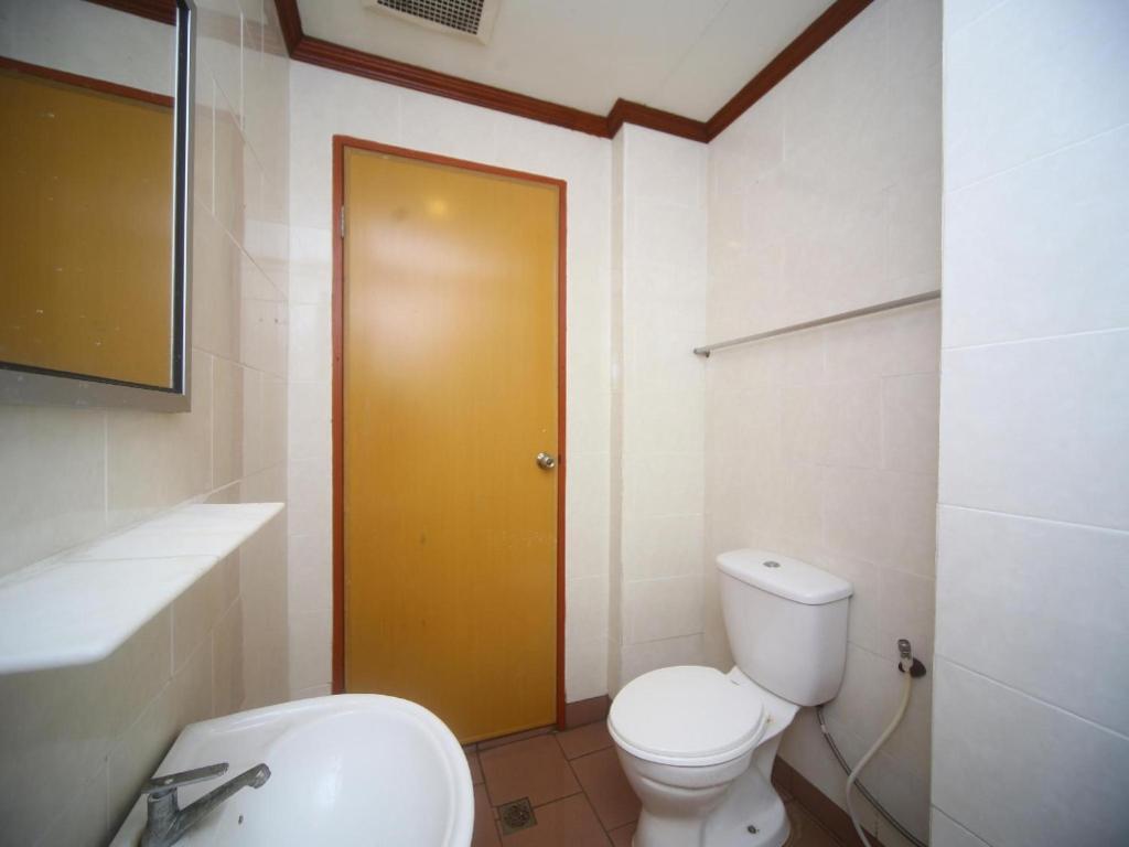 Koupelna v ubytování Super OYO 1027 Hotel London