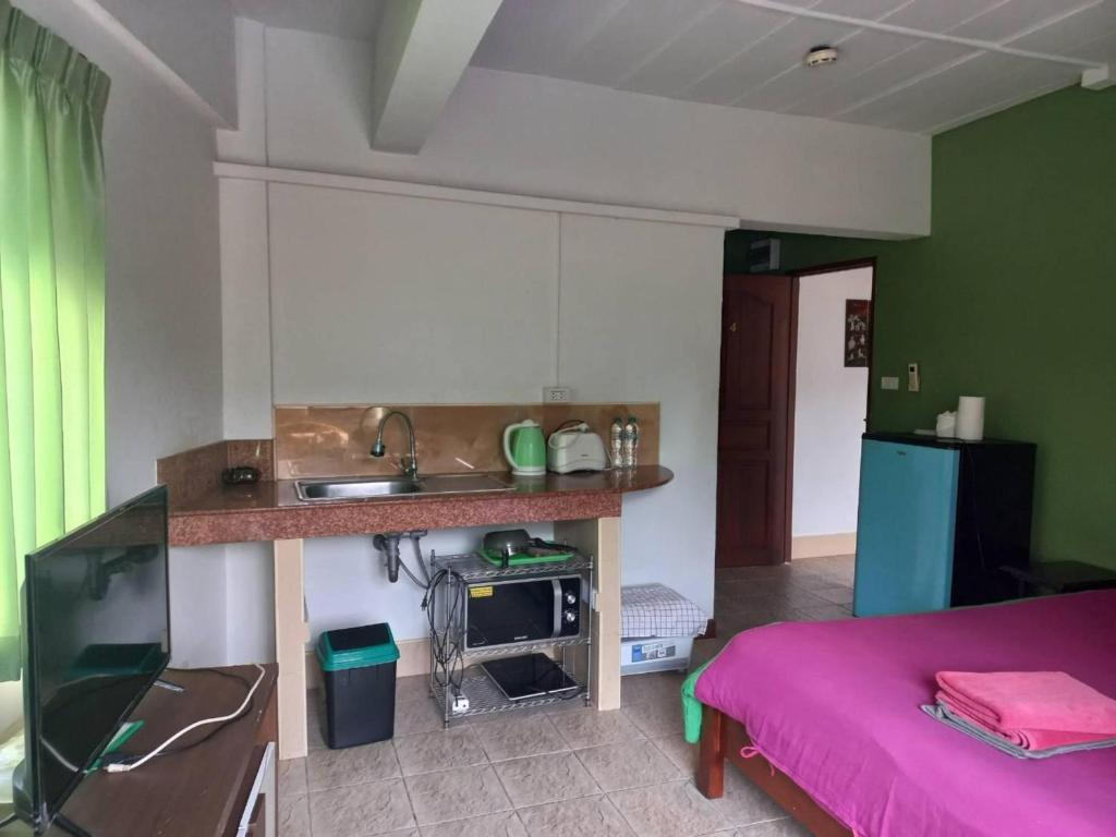 OYO 75474 Funkey Fulung Andy & Tan Guest House - Resim 18