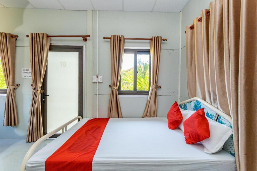 Postel nebo postele na pokoji v ubytování Linh Dan Bungalow