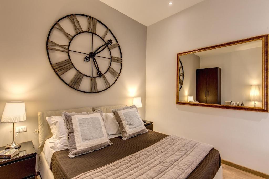 Posteľ alebo postele v izbe v ubytovaní Sweet Stay In Rome