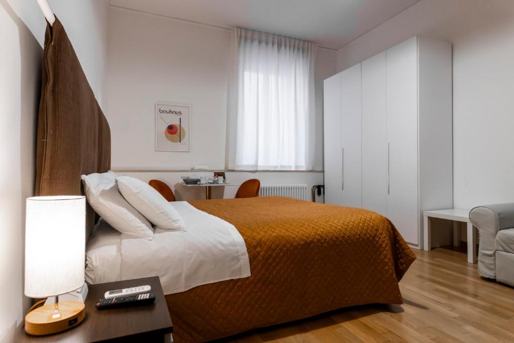 Postel nebo postele na pokoji v ubytování Casa Arnaldo