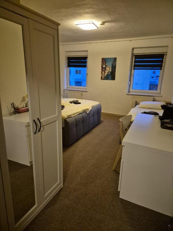 Postel nebo postele na pokoji v ubytování Hotel Garni Krone