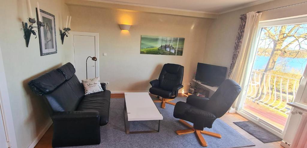 Posezení v ubytování Exklusive Ferienwohnung Strohberg