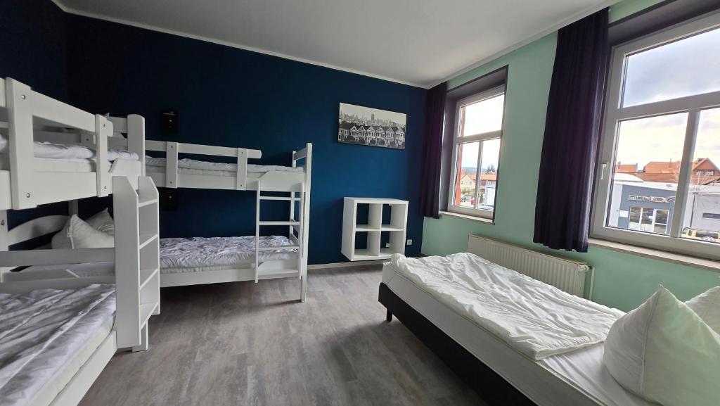 Letto o letti in una camera di Harz Hostel
