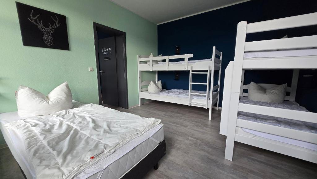 Letto o letti in una camera di Harz Hostel