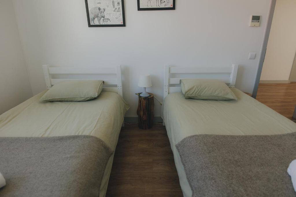 Postel nebo postele na pokoji v ubytování Centro Rewilding