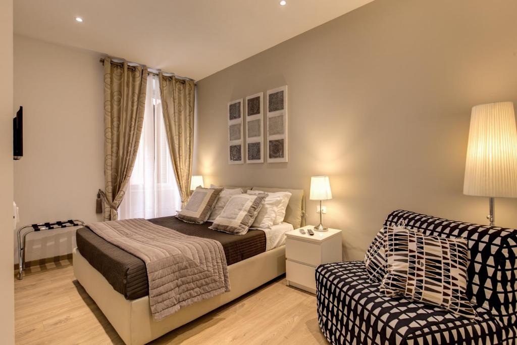 Posteľ alebo postele v izbe v ubytovaní Sweet Stay In Rome