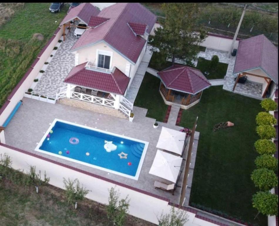 an overhead view of a house with a swimming pool at Vila Gracija in Arandelovac