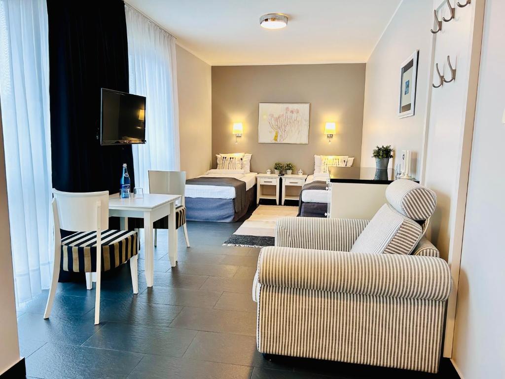 Posezení v ubytování HOTEL Amber Suite & SPA - Enklawa dla Dorosłych