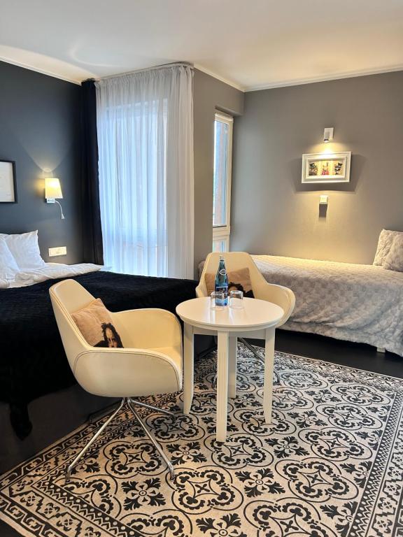 Postel nebo postele na pokoji v ubytování HOTEL Amber Suite & SPA - Enklawa dla Dorosłych