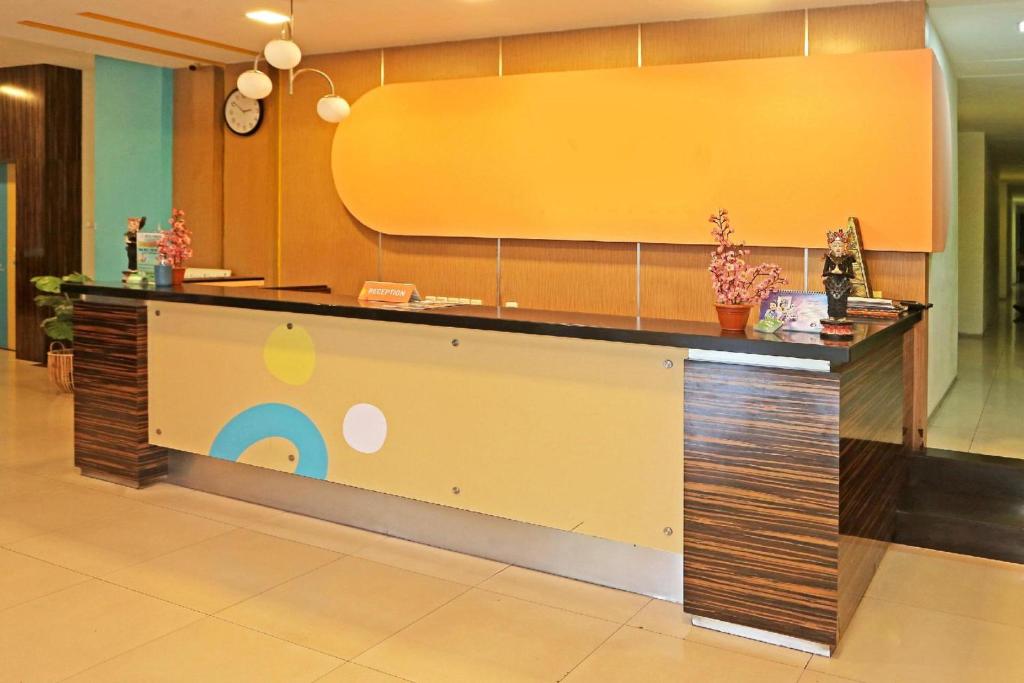 Fotografie z fotogalerie ubytování Super OYO Townhouse OAK Hotel Fiducia Serpong v destinaci Serpong