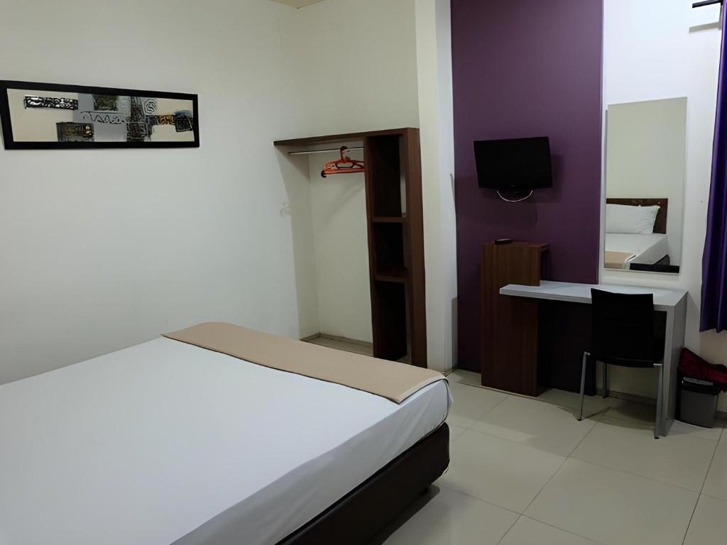 TV a/nebo společenská místnost v ubytování Super OYO Townhouse OAK Hotel Fiducia Serpong