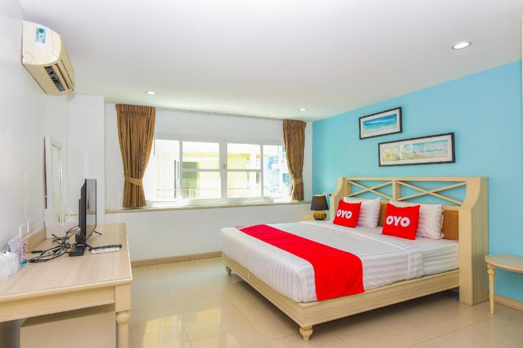 Postel nebo postele na pokoji v ubytování OYO 394 Nana Beach Cha Am