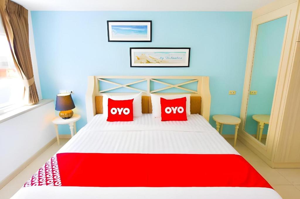 Postel nebo postele na pokoji v ubytování OYO 394 Nana Beach Cha Am