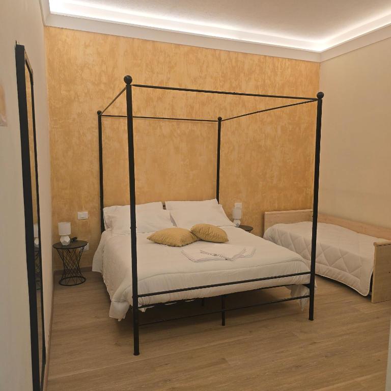 Postel nebo postele na pokoji v ubytování 20Marchi