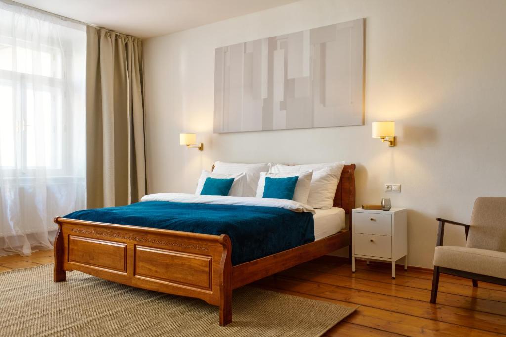 Postel nebo postele na pokoji v ubytování Latran House 71 by KH