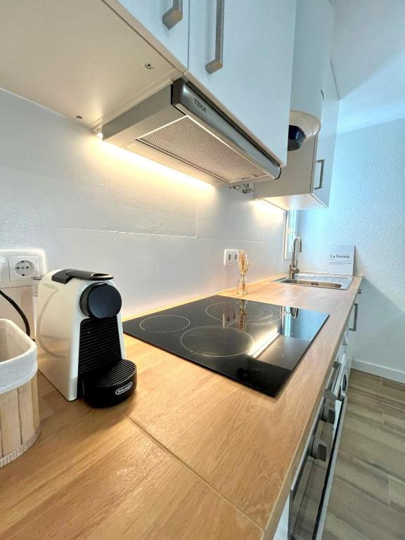 A kitchen or kitchenette at Apartamento Oasis Mediterráneo