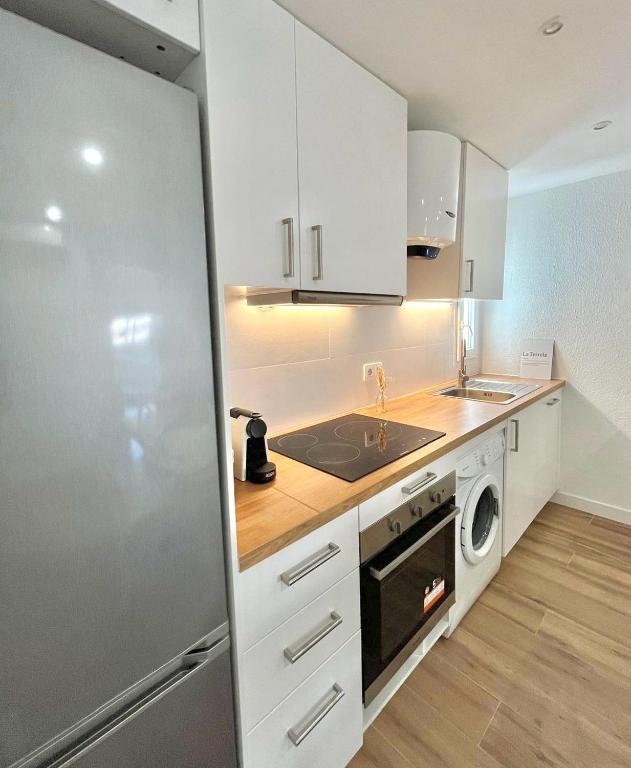 A kitchen or kitchenette at Apartamento Oasis Mediterráneo