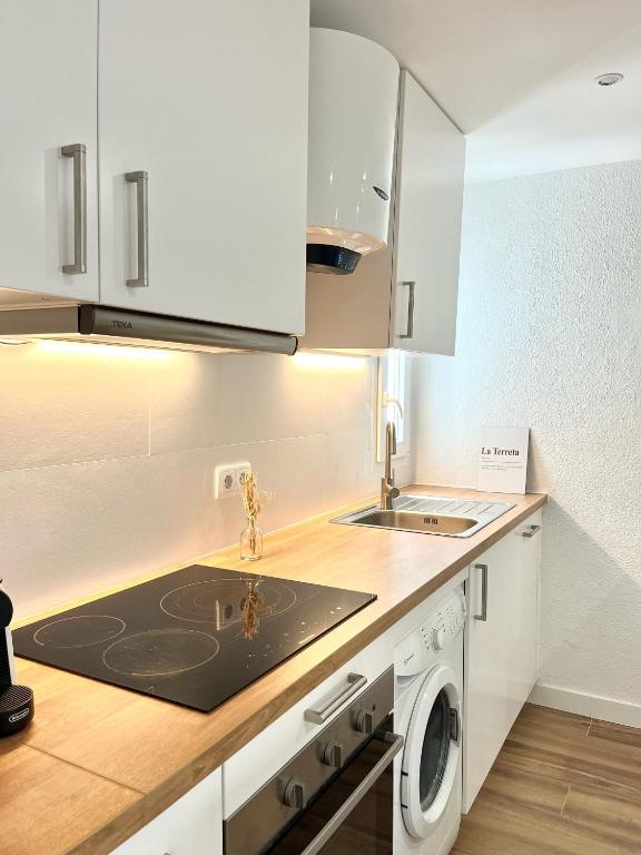 A kitchen or kitchenette at Apartamento Oasis Mediterráneo