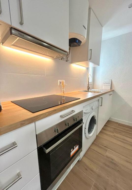 A kitchen or kitchenette at Apartamento Oasis Mediterráneo