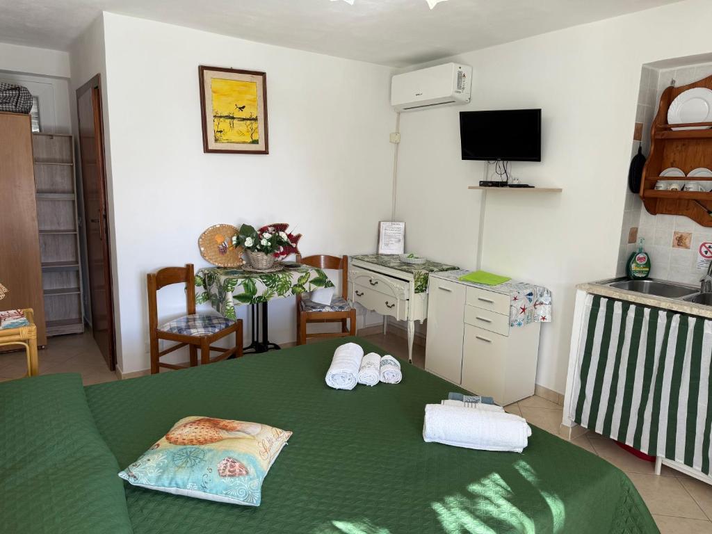 Postel nebo postele na pokoji v ubytování Ponzamania Appartamenti da Silverio
