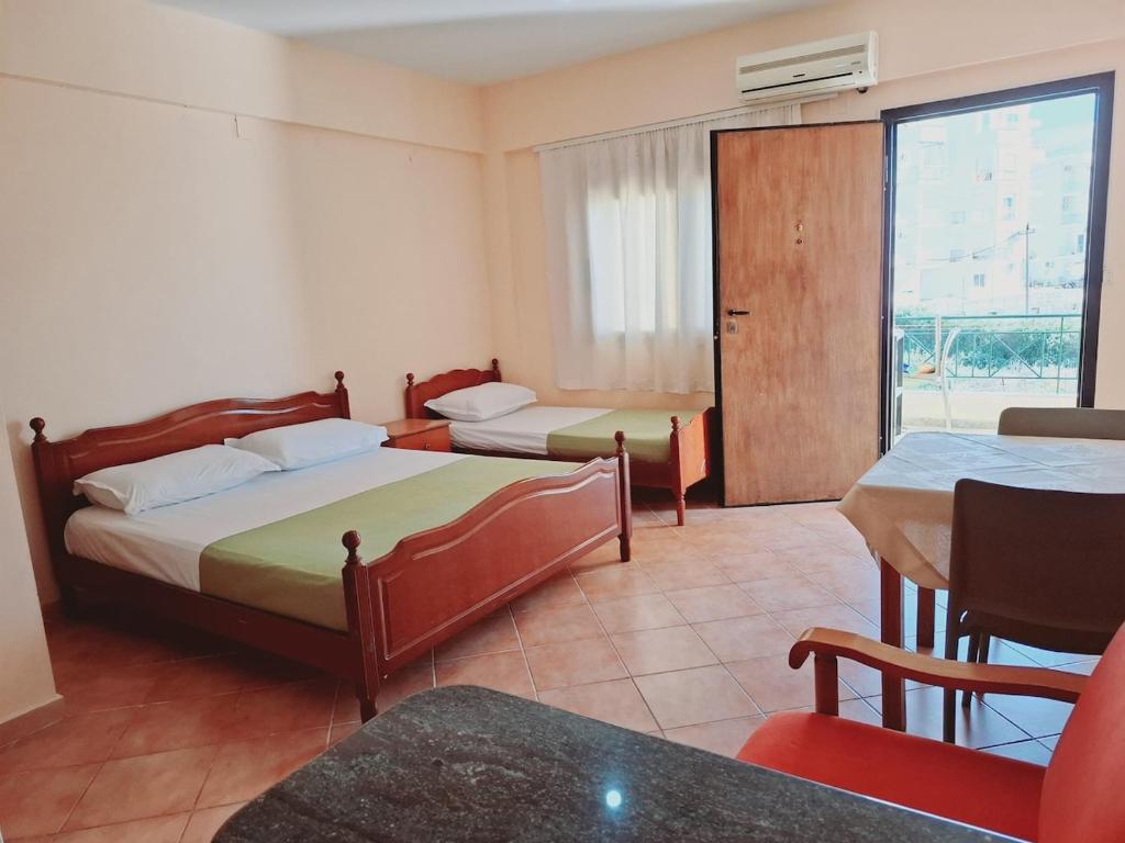 Postel nebo postele na pokoji v ubytování Hera Room