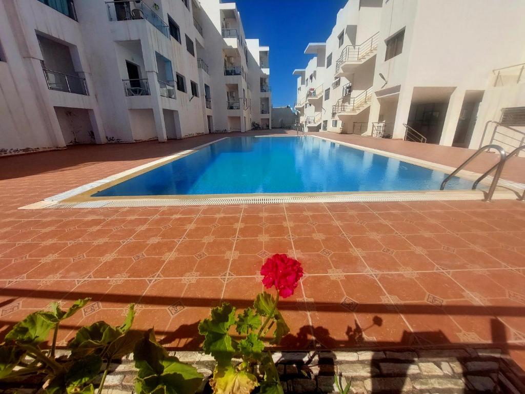 Bazén v ubytování Safari Stay Appart front mer avec piscine nebo v jeho okolí