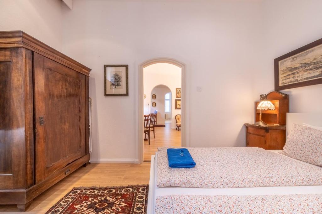 A bed or beds in a room at Hungarian Souvenir