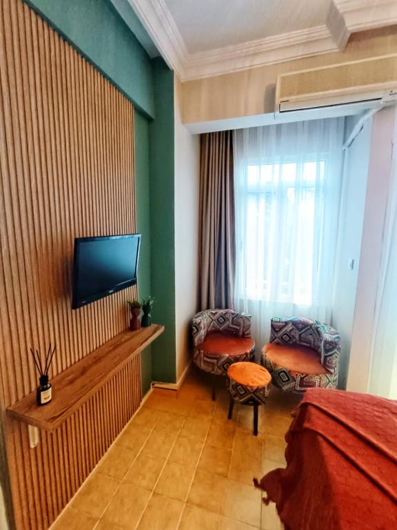 TV a/nebo společenská místnost v ubytování Sureyya Hotel By Kalipso