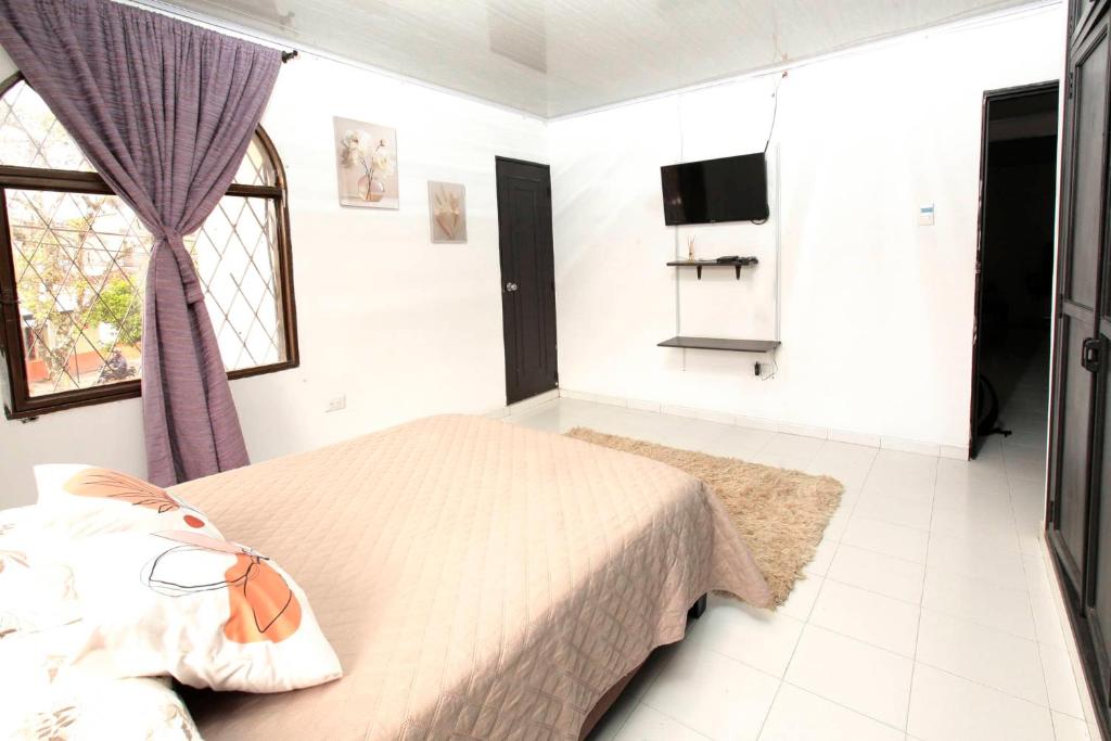Voodi või voodid majutusasutuse Home Travel Popayan toas