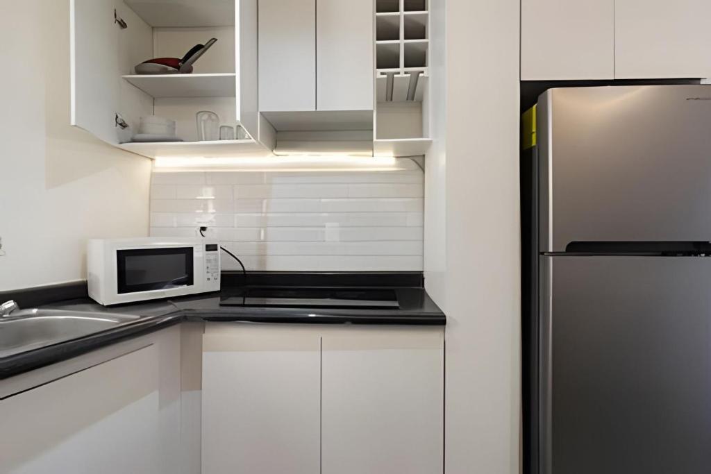 Kuchyň nebo kuchyňský kout v ubytování 2ndHome Calzada