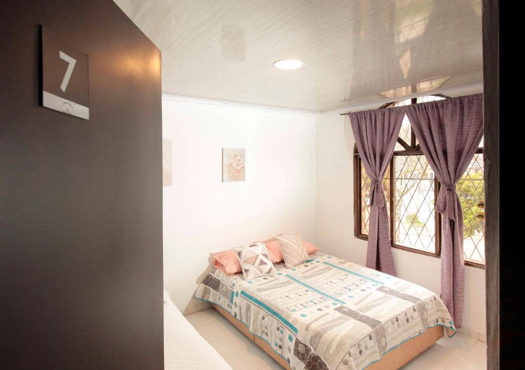 Voodi või voodid majutusasutuse Home Travel Popayan toas
