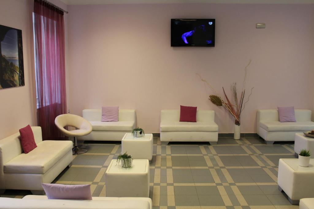Posezení v ubytování Hotel Santa Marta