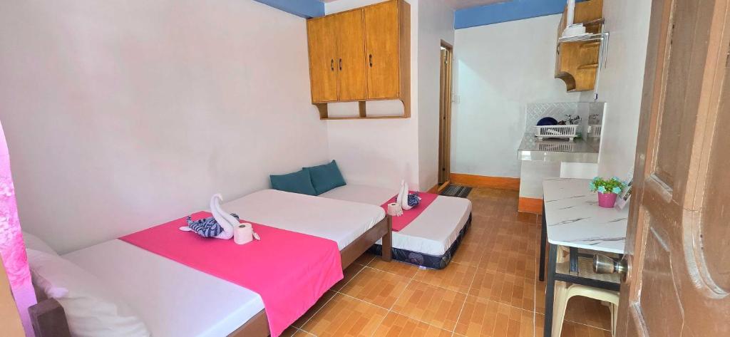 Postel nebo postele na pokoji v ubytování BEB'S & JOCEL Apartment