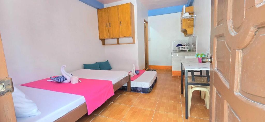 Postel nebo postele na pokoji v ubytování BEB'S & JOCEL Apartment