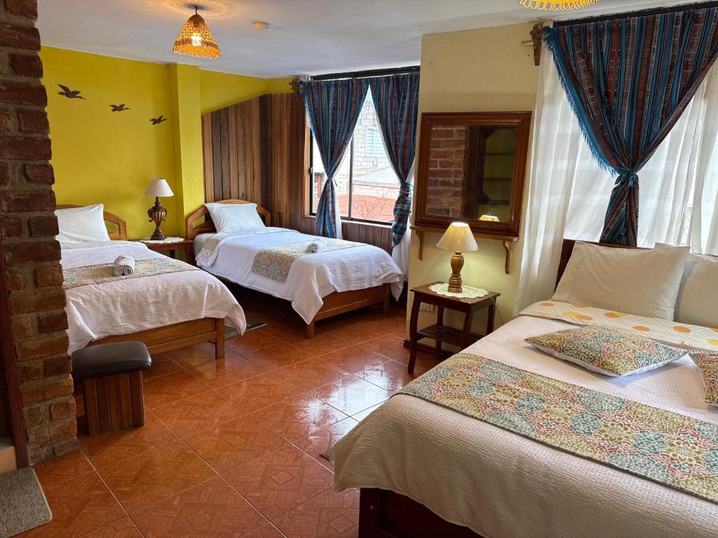 Postel nebo postele na pokoji v ubytování Hotel Donde Ivan